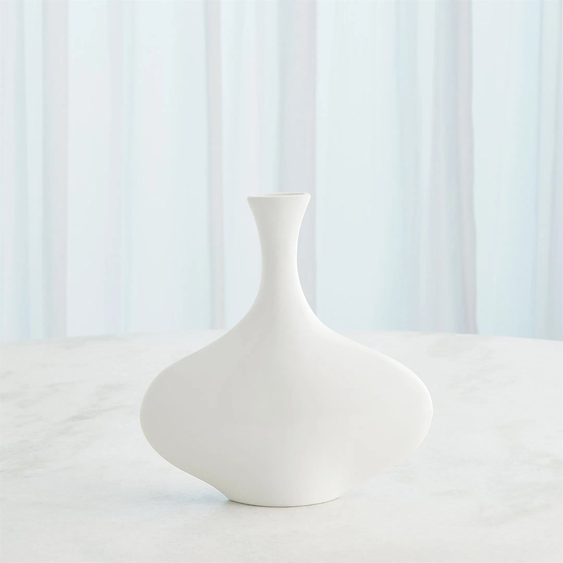 Silhouette Vase by Global Views. Made from ceramic in a modern style.