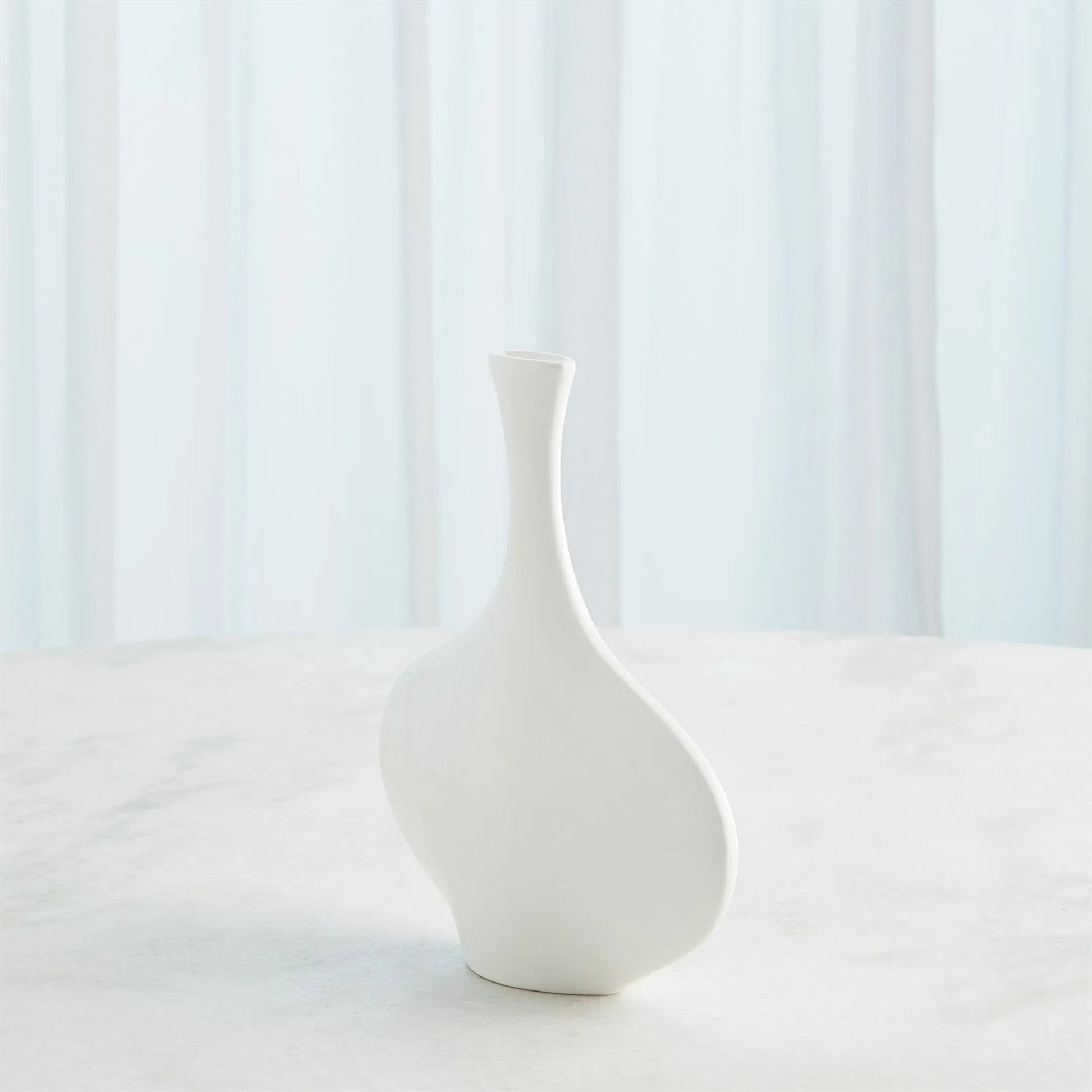 Silhouette Vase by Global Views. Made from ceramic in a modern style.