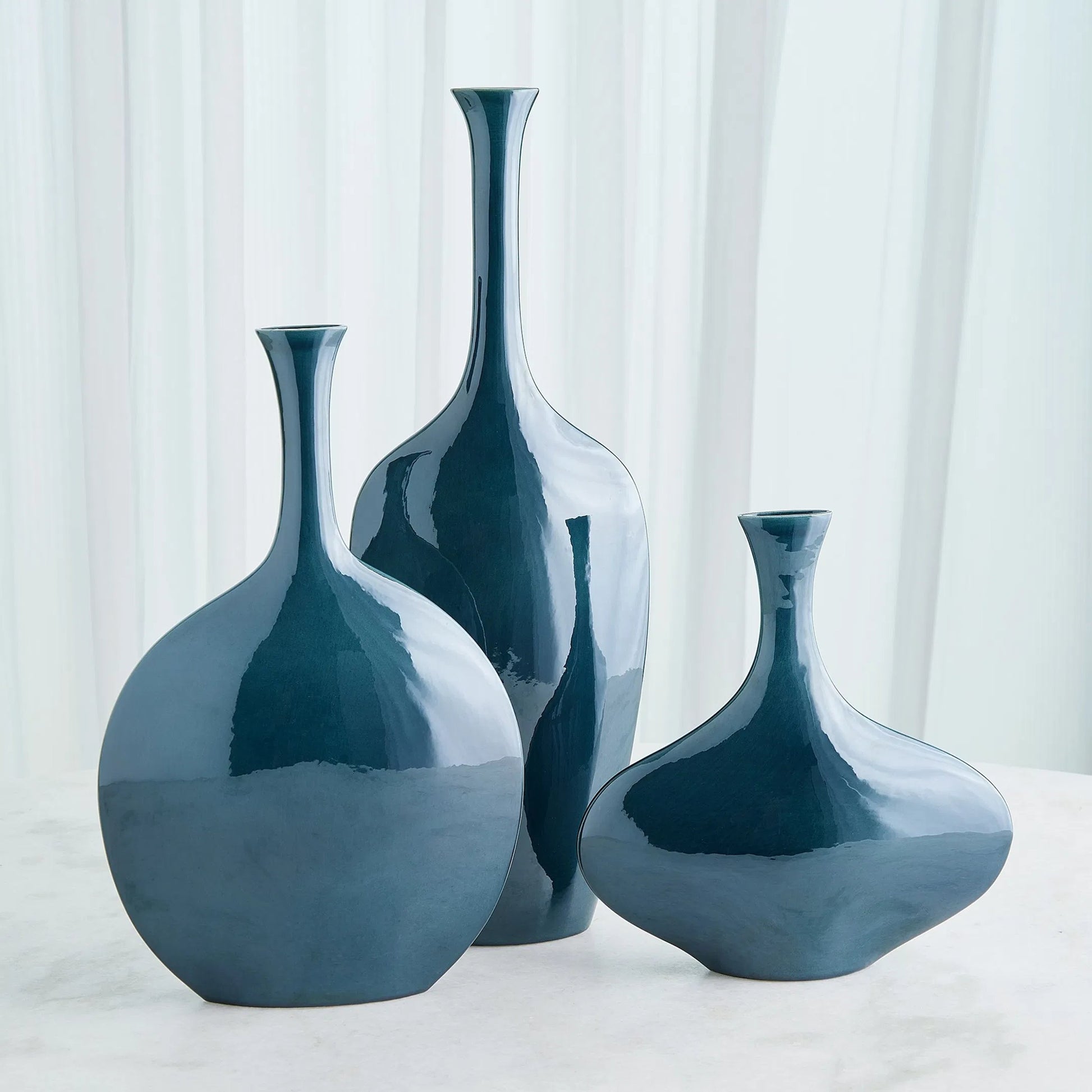 Silhouette Vase by Global Views. Made from ceramic in a modern style.