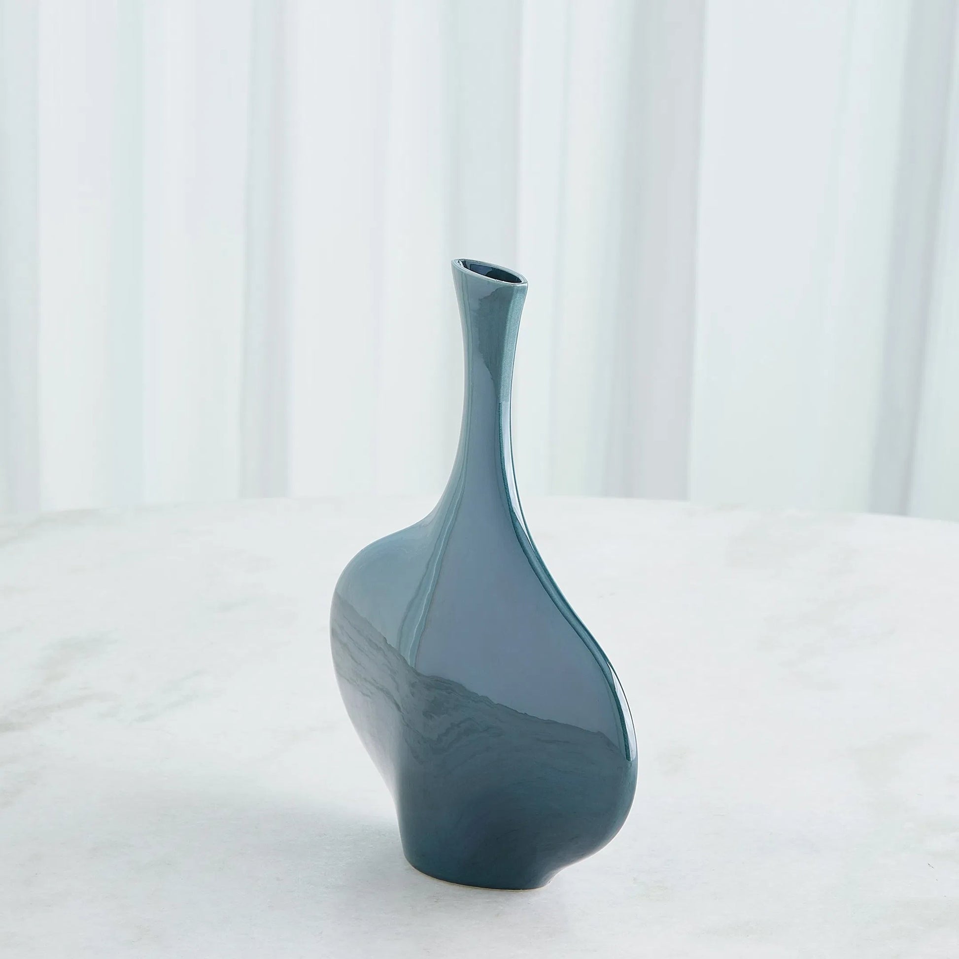 Silhouette Vase by Global Views. Made from ceramic in a modern style.