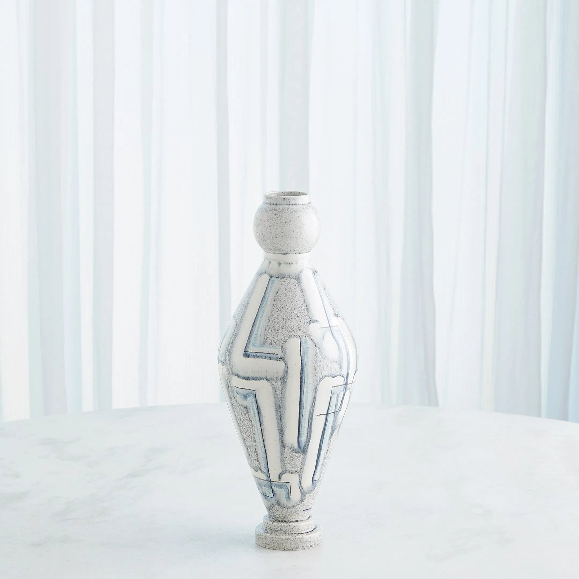 Spindle Vase by Global Views in grey, blue painted. Made from ceramic in a unique style.