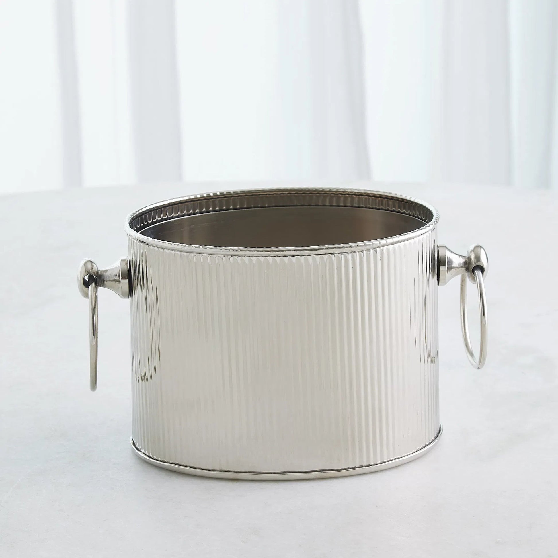 Winston Ice Bucket by Global Views. Made from stainless steel in a modern style.