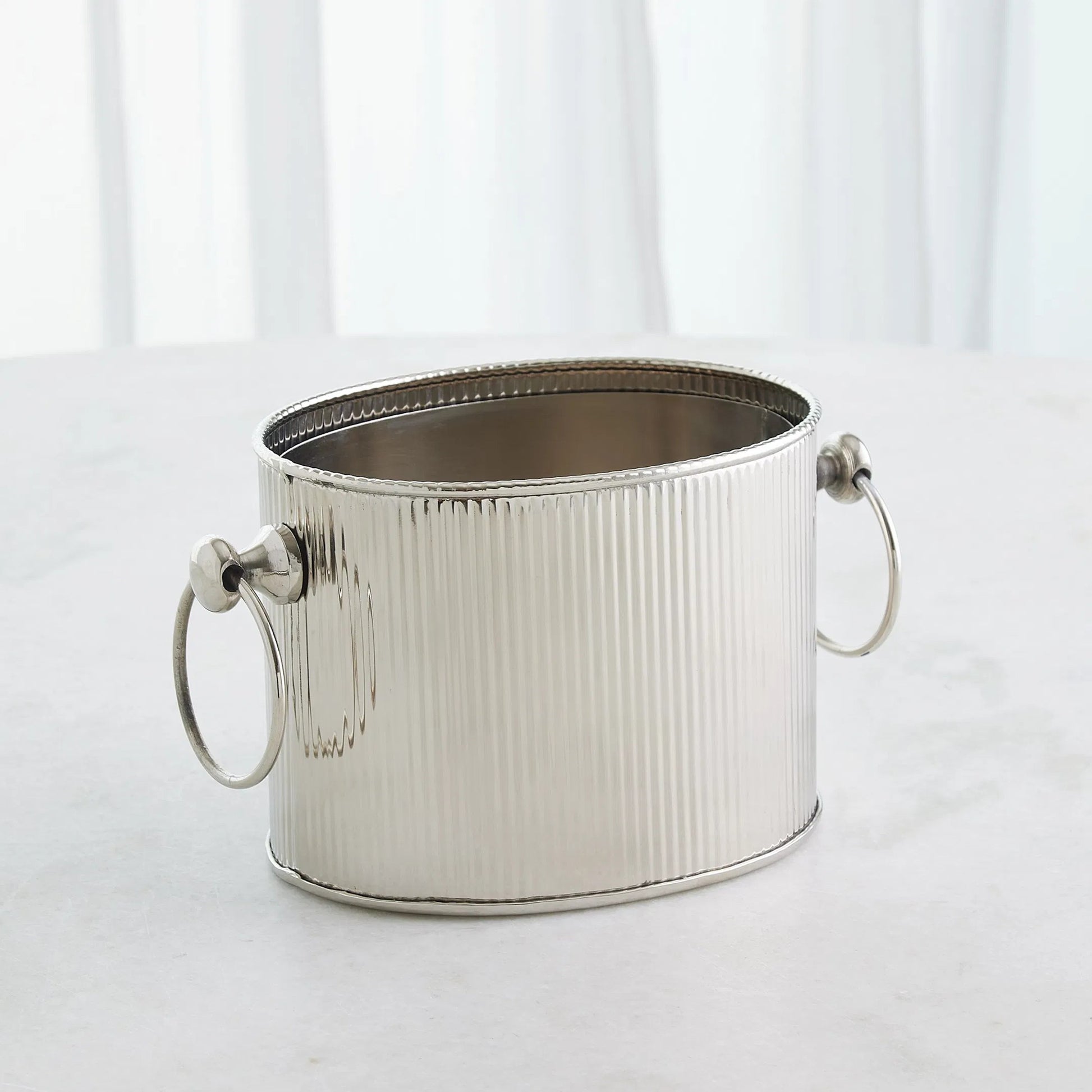 Winston Ice Bucket by Global Views. Made from stainless steel in a modern style.