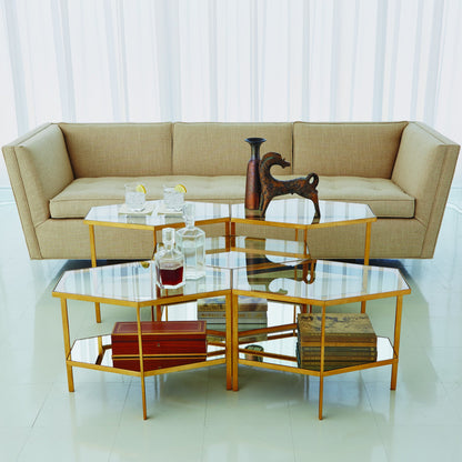 Hexagon Table by Global Views in gold leaf. Made from unique in a transitional style.