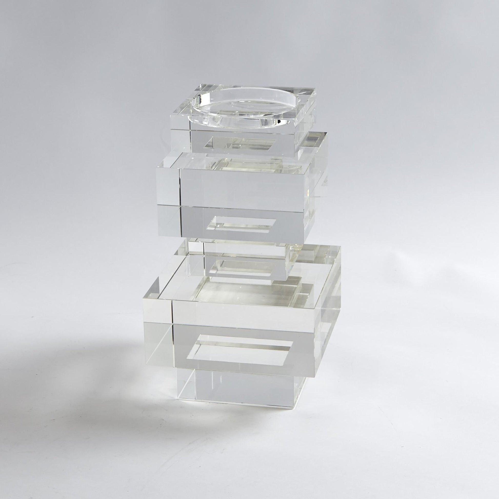 Brilliant Pillar Candle Holder by Global Views. Made from crystal in a transitional style.