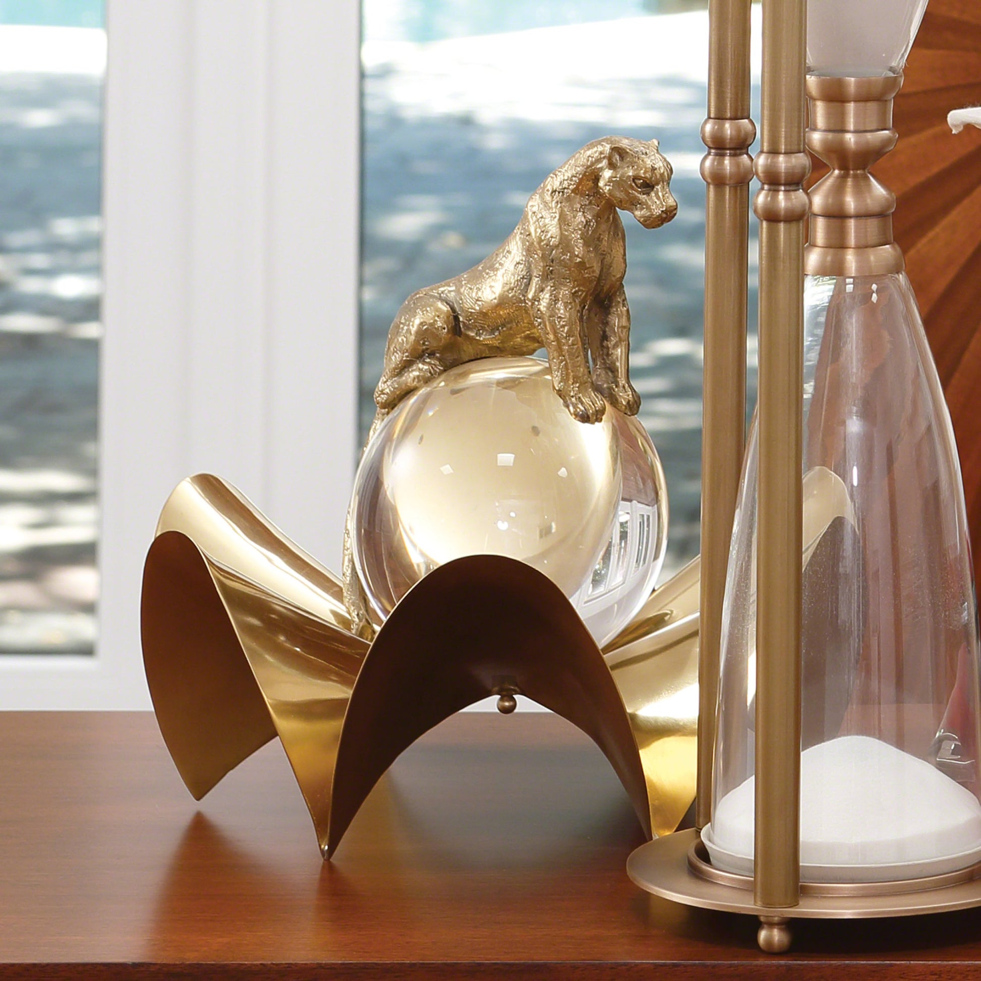 Jaguar on Crystal Ball by Global Views. Made from brass, crystal in a eclectic & global style.