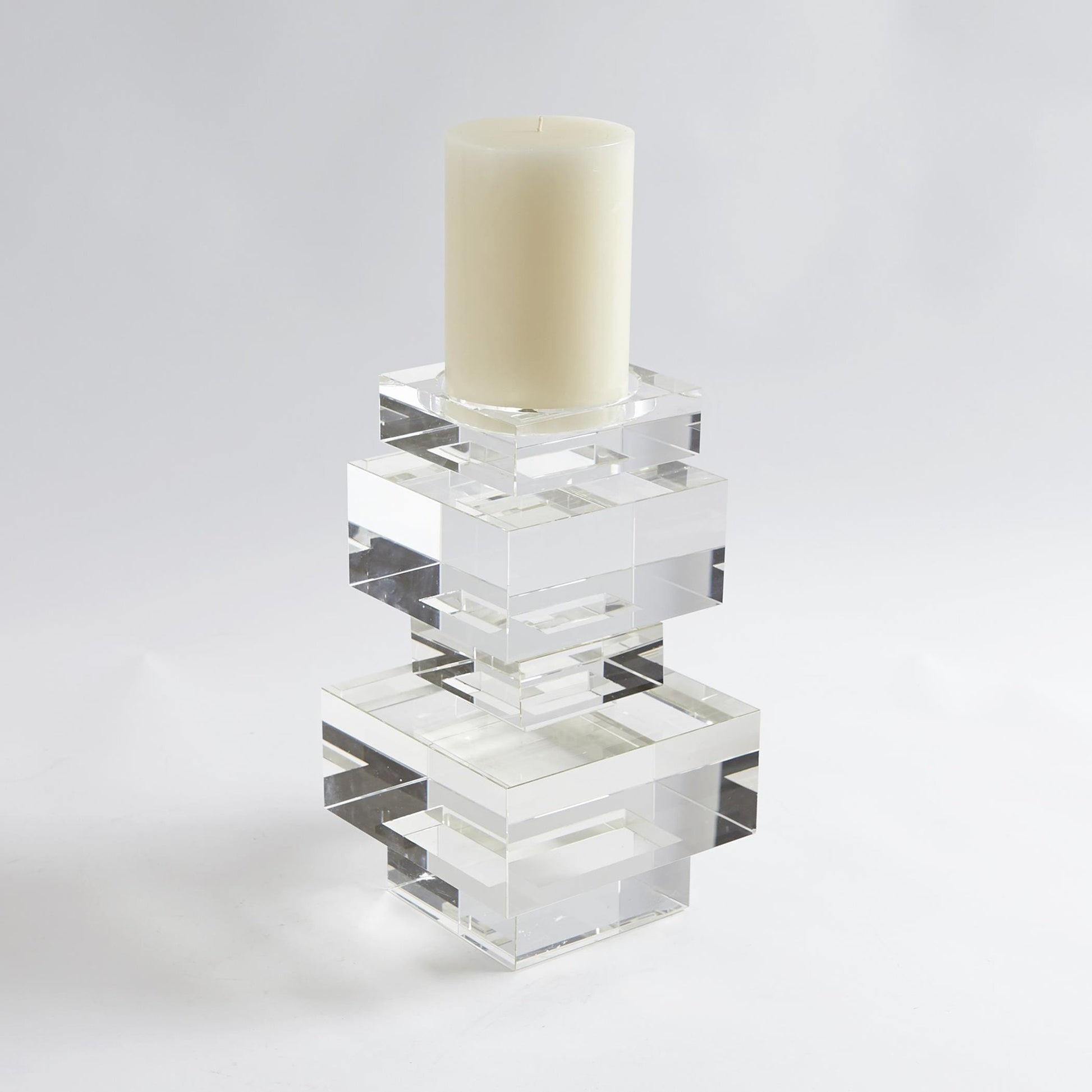 Brilliant Pillar Candle Holder by Global Views. Made from crystal in a transitional style.