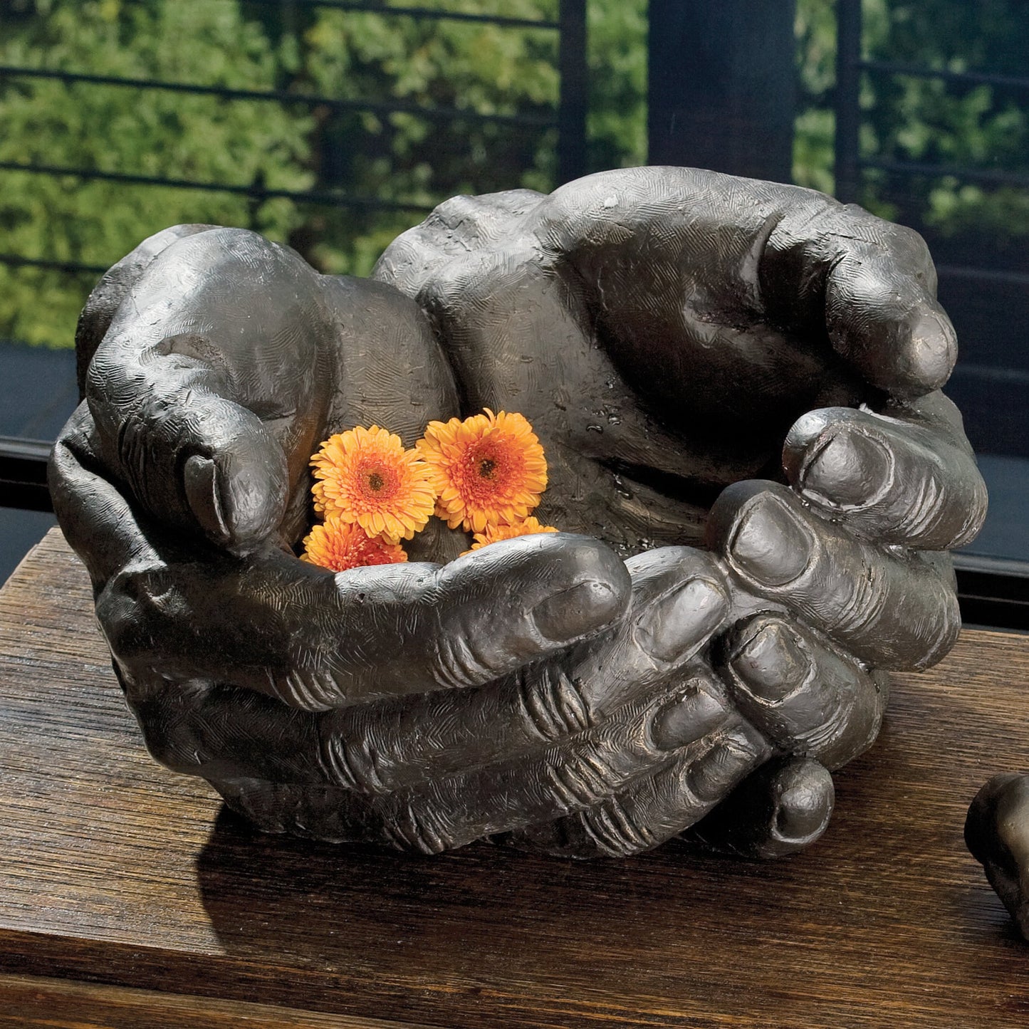 003 SR-701349 | Lifestyle | Hand Bowl by Global Views in antique statuary bronze. Made from iron in a eclectic & global style.