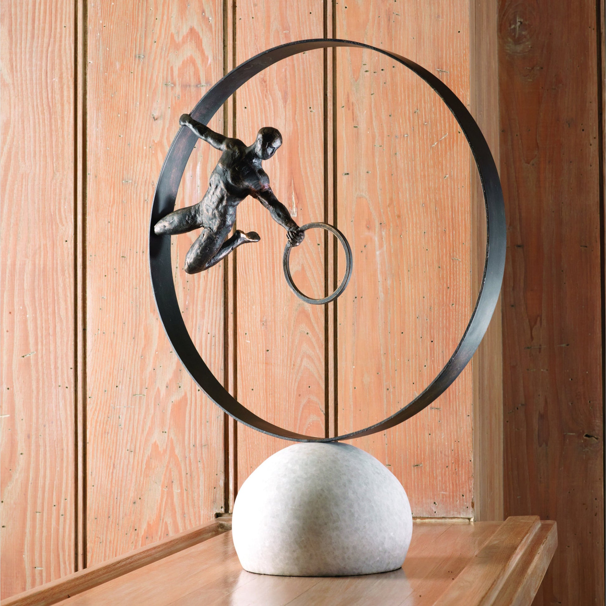 Circle in Circle Man by Global Views. Made from iron, white marble in a eclectic & global style.