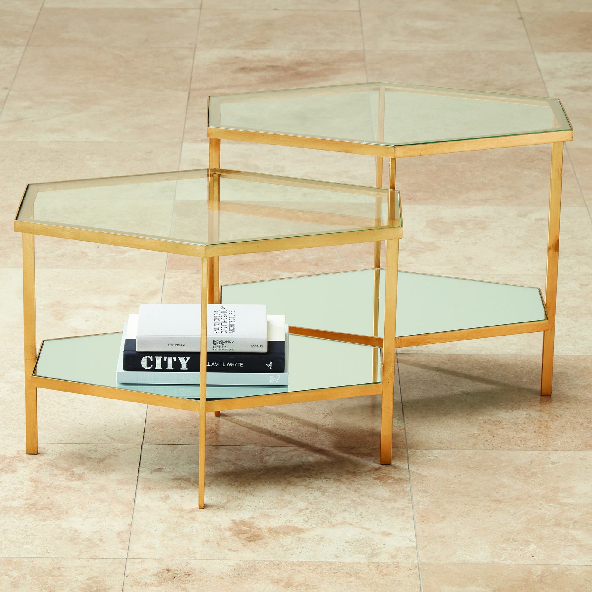 Hexagon Table by Global Views in gold leaf. Made from unique in a transitional style.