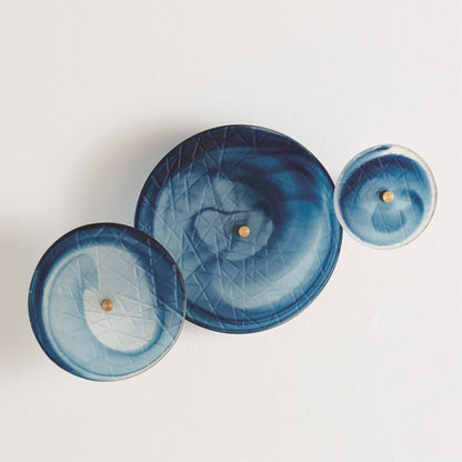 Crosshatched Wall Discs by Global Views. Made from glass in a modern style.