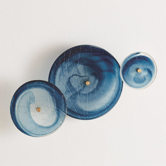 Crosshatched Wall Discs by Global Views. Made from glass in a modern style.