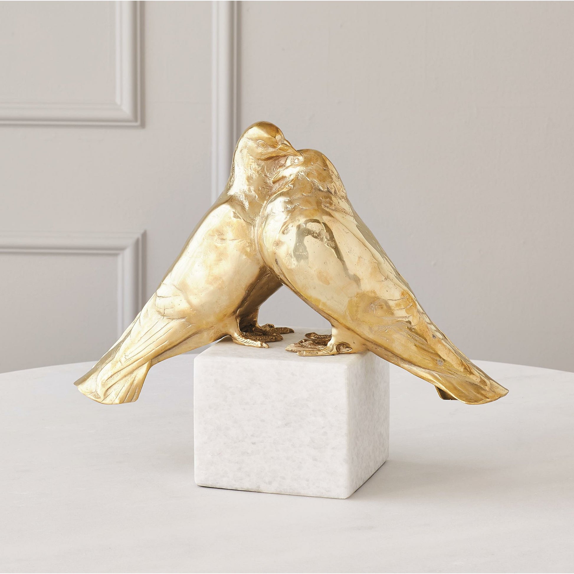 Love Doves by Global Views in brass. Made from brass, white marble in a transitional style.
