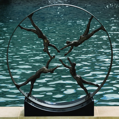 Reaching for Center Sculpture by Global Views. Made from iron, granite in a eclectic & global style.