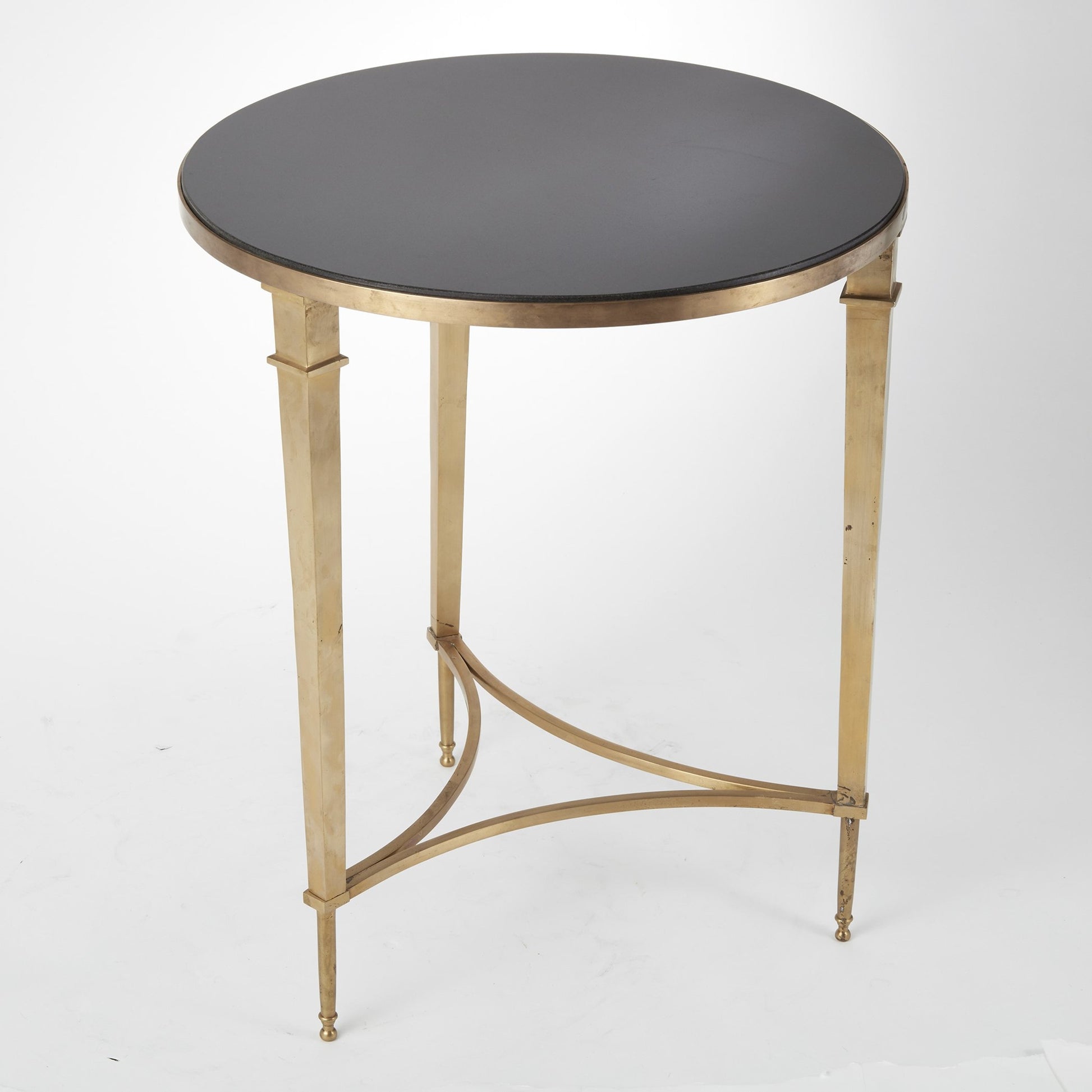 Round French Square Leg Table by Global Views in brass. Made from brass, granite in a transitional style.