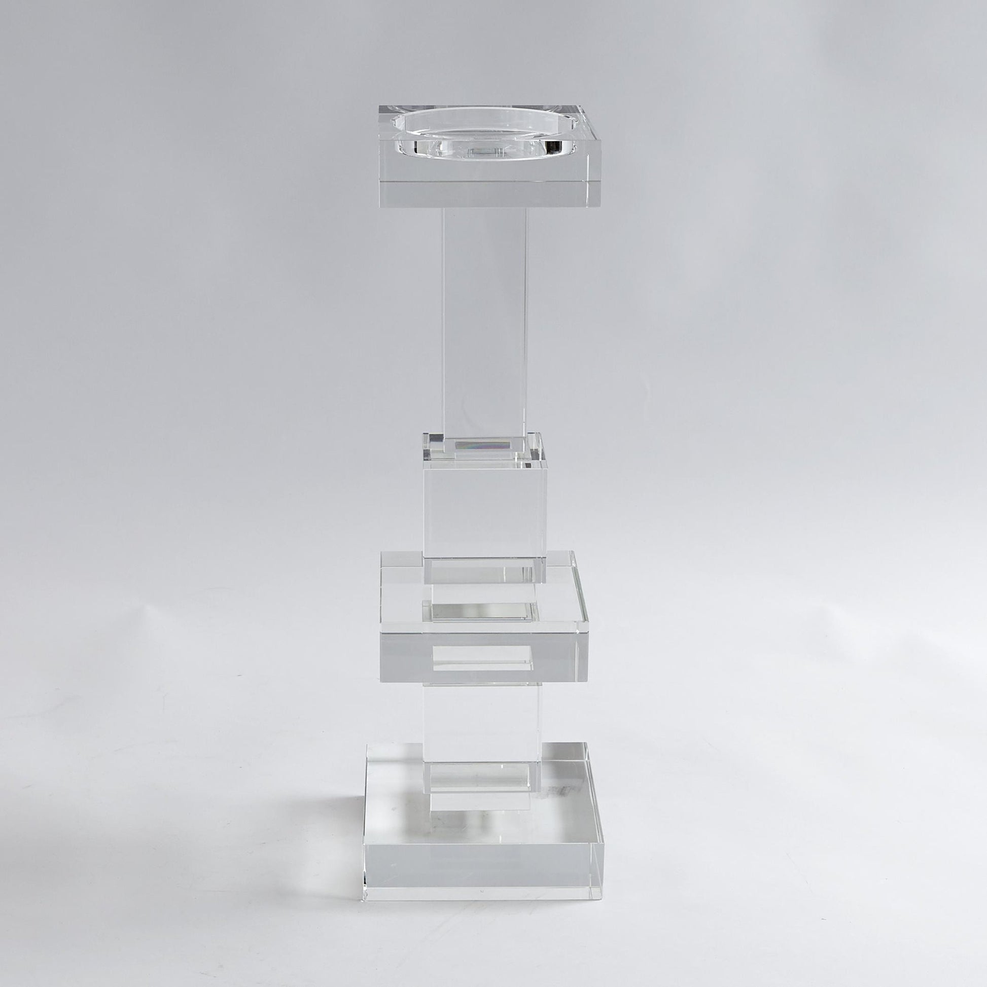 Brilliant Pillar Candle Holder by Global Views. Made from crystal in a transitional style.