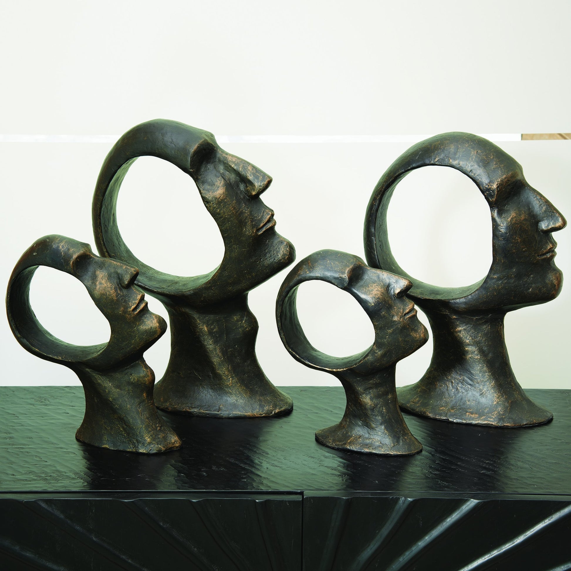 Hollow Head Man by Global Views in bronze. Made from iron in a eclectic & global style.