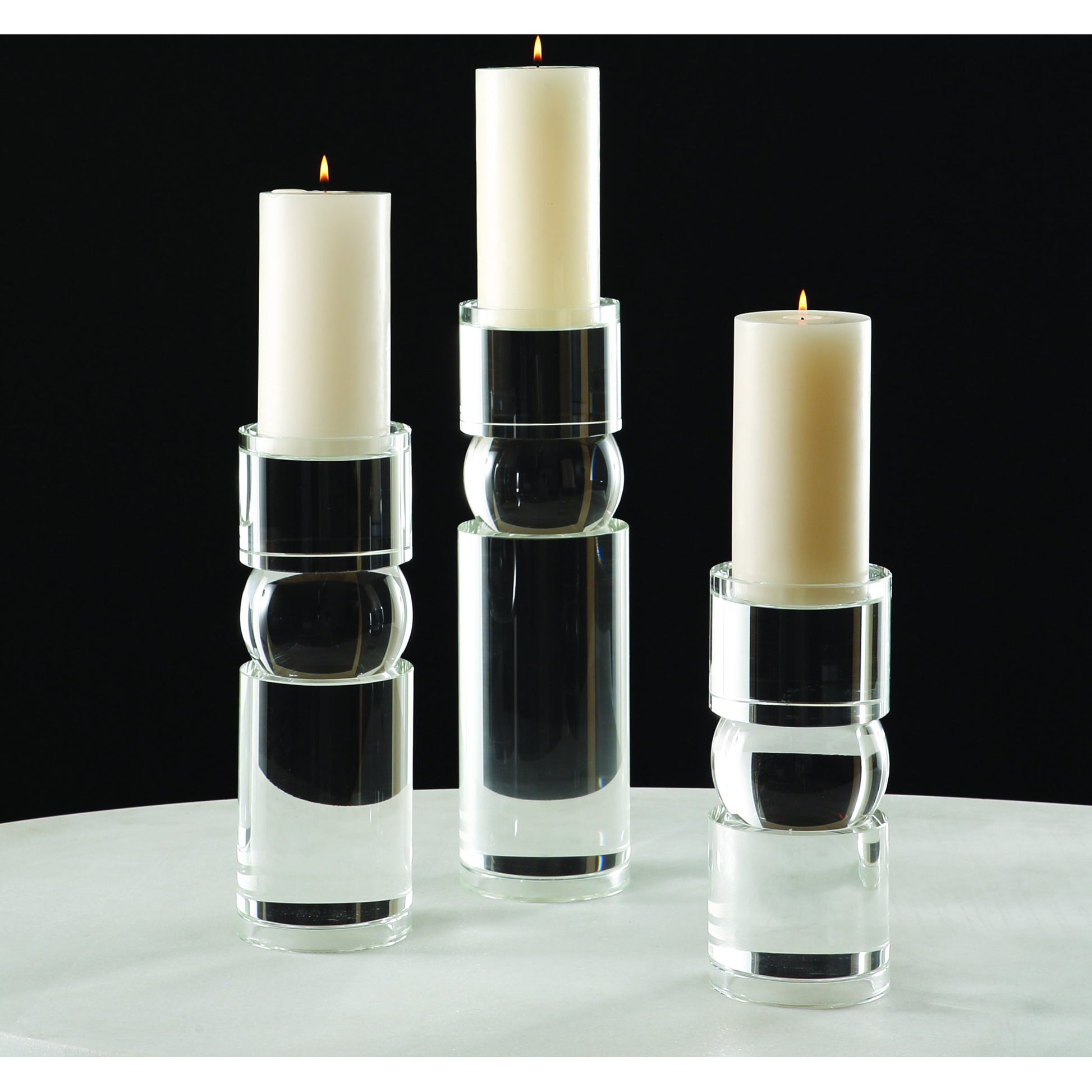Bipolar Crystal Candle Holder by Global Views. Made from crystal in a transitional style.