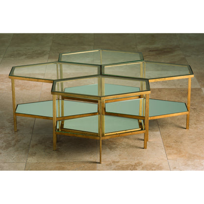 Hexagon Table by Global Views in gold leaf. Made from unique in a transitional style.