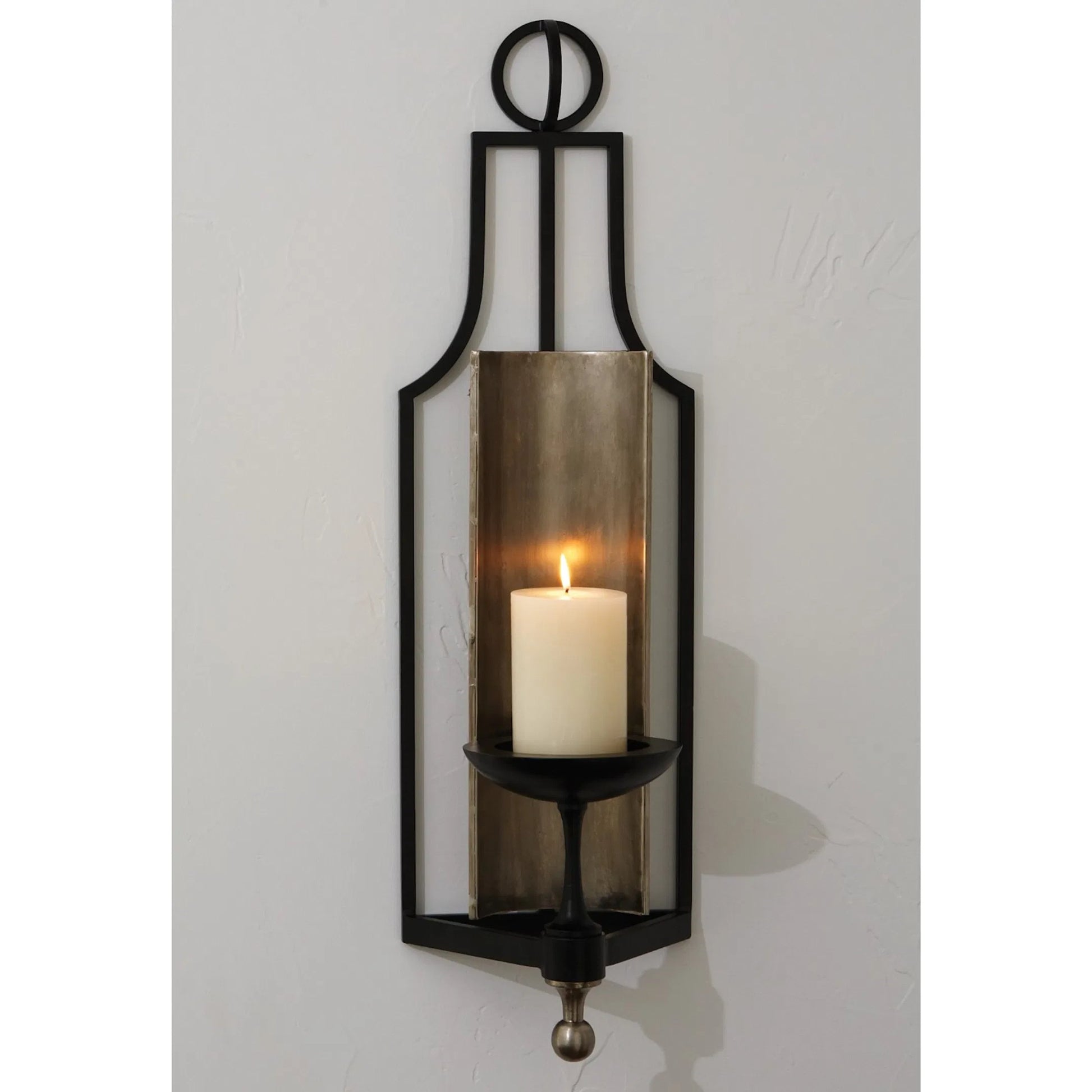 Classic Wall Sconce by Global Views in black powder coat. Made from iron in a modern style.