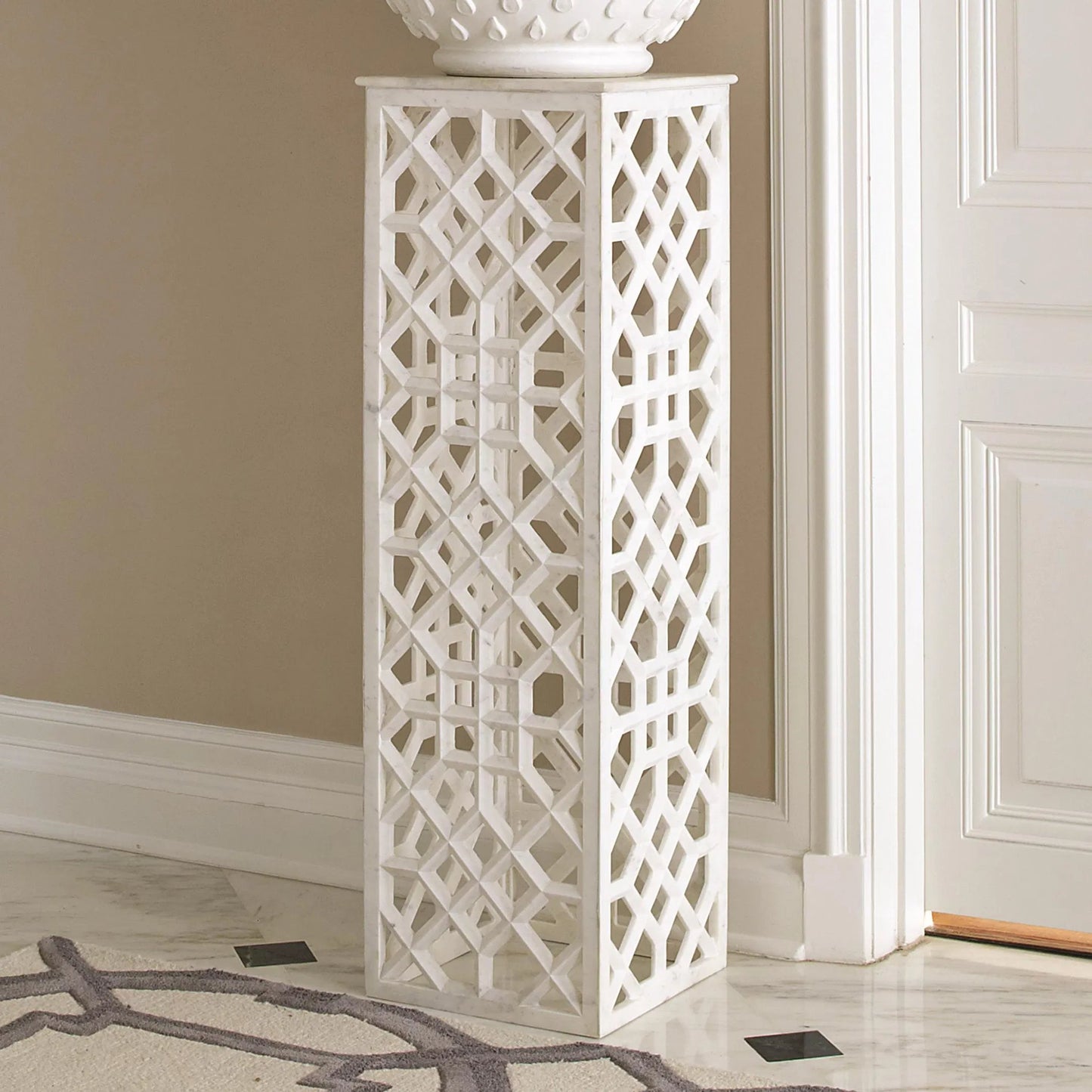 002 SR-701278 | Lifestyle | Fret Pedestal by Global Views. Made from hand carved honed white marble in a transitional style.