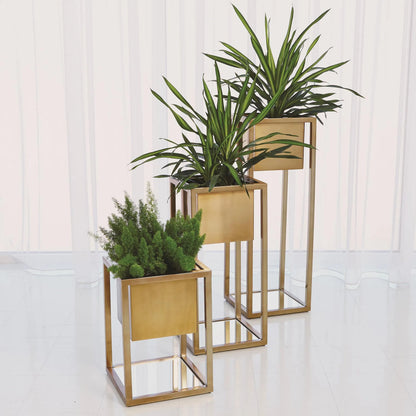 Escher Pedestal Planter by Global Views. Made from unique in a modern style.