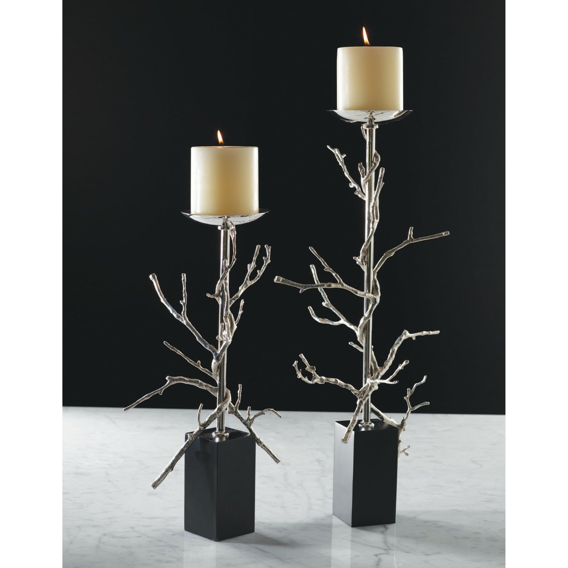 Twig Candle Holder by Global Views in brass. Made from brass, mild steel, cast iron in a modern style.