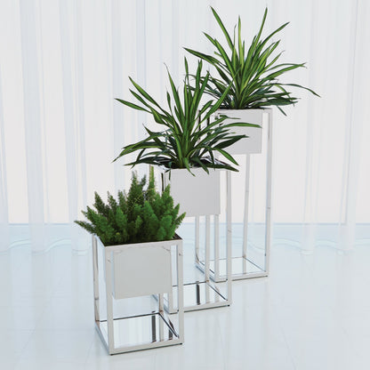 Escher Pedestal Planter by Global Views. Made from unique in a modern style.