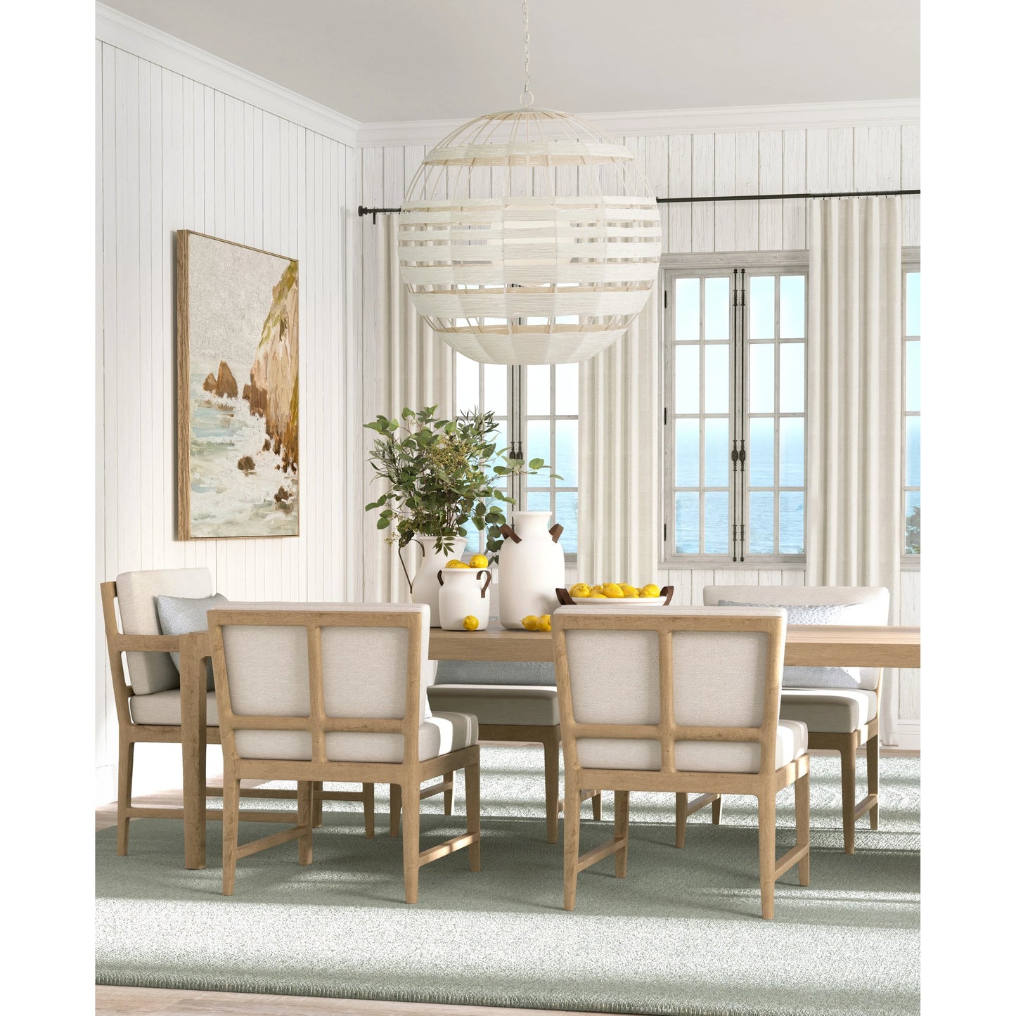 004 SI-1923992 | Lifestyle | Lapsley Orb Chandelier by Currey and Company in vanilla, white. Made from wrought iron, kraft paper twine, frosted glass in a modern style.
