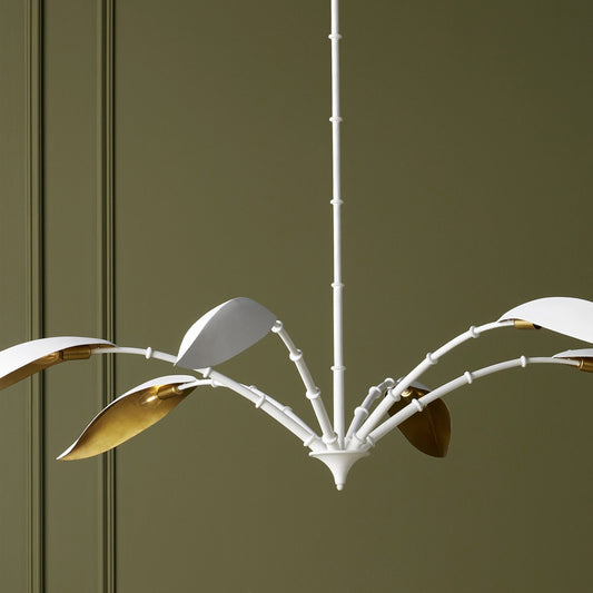 Yuriko Chandelier by Currey and Company in gesso white, contemporary gold leaf. Made from wrought iron in a modern style.