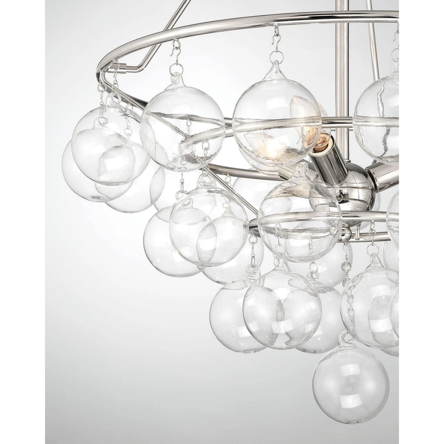 003 SI-1965983 | Closeup | Isla 3-Light Chandelier by Lumanity in polished nickel. Made from iron, glass in a modern style.