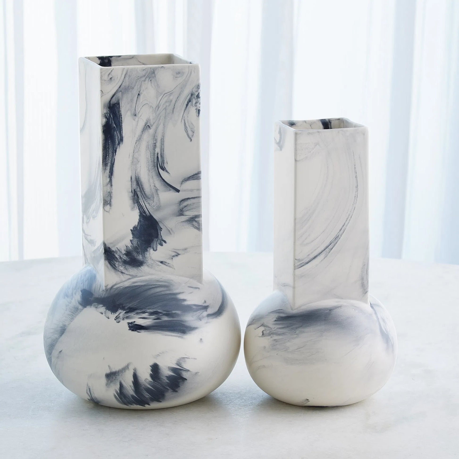 Crocus Vase by Global Views. Made from earthenware in a modern style.