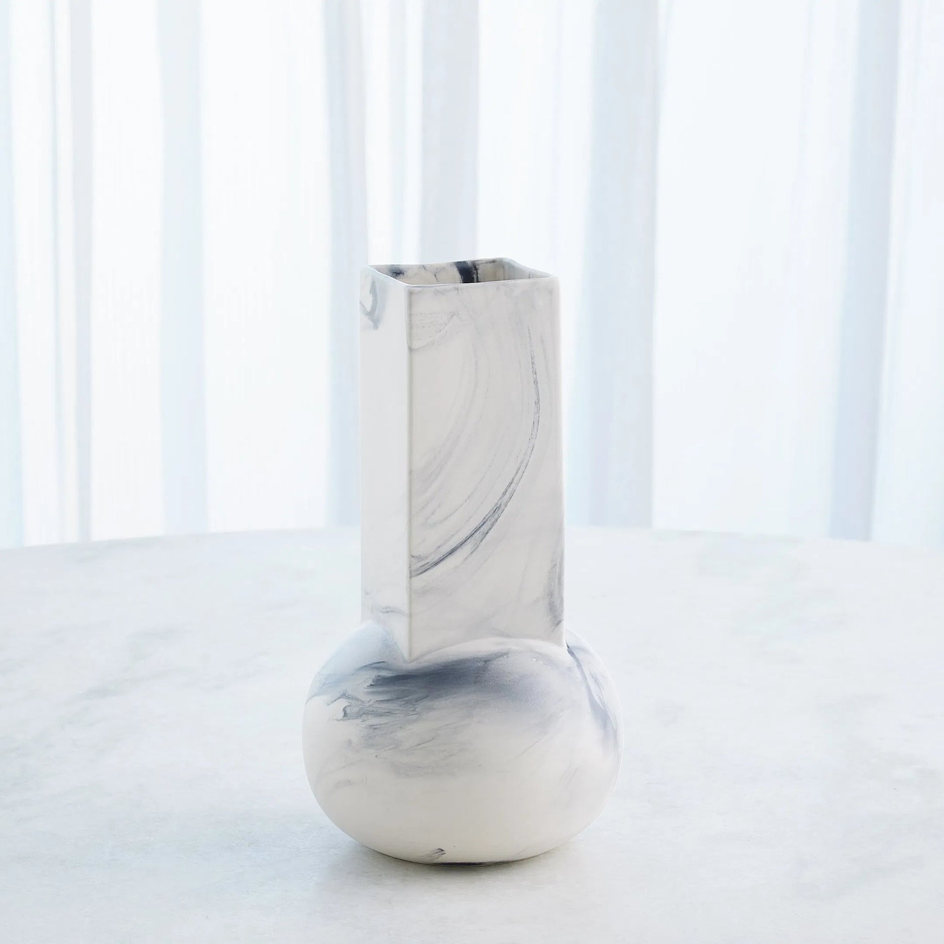 Crocus Vase by Global Views. Made from earthenware in a modern style.