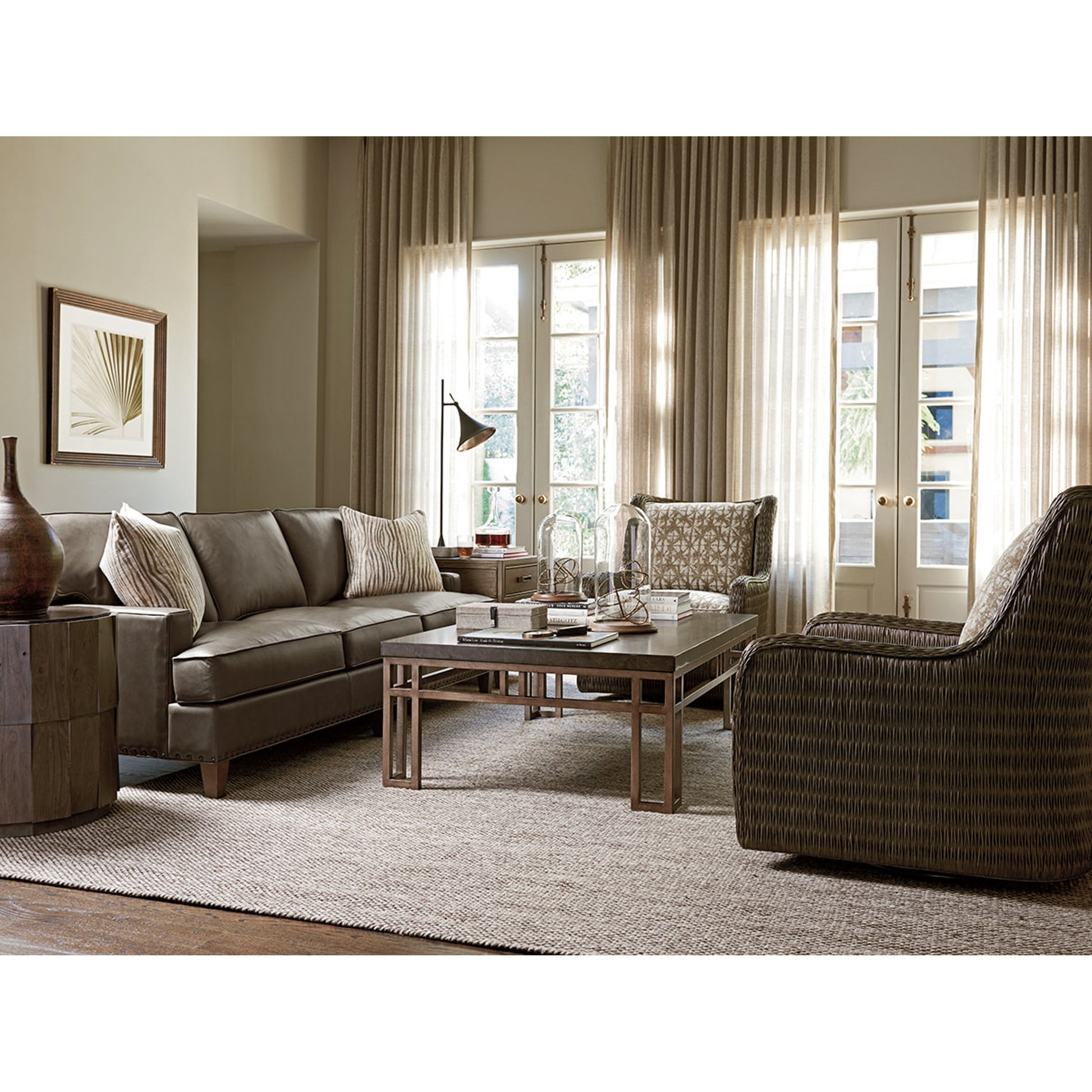 Everett Round Travertine End Table by Tommy Bahama Home. Made from unique in a eclectic & global style.