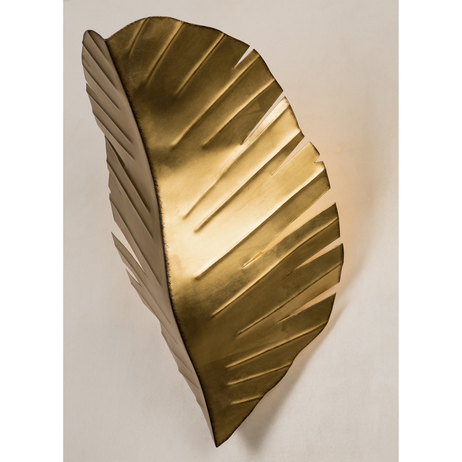 Banana Sconce by Varaluz in gold. Made from unique in a coastal style.