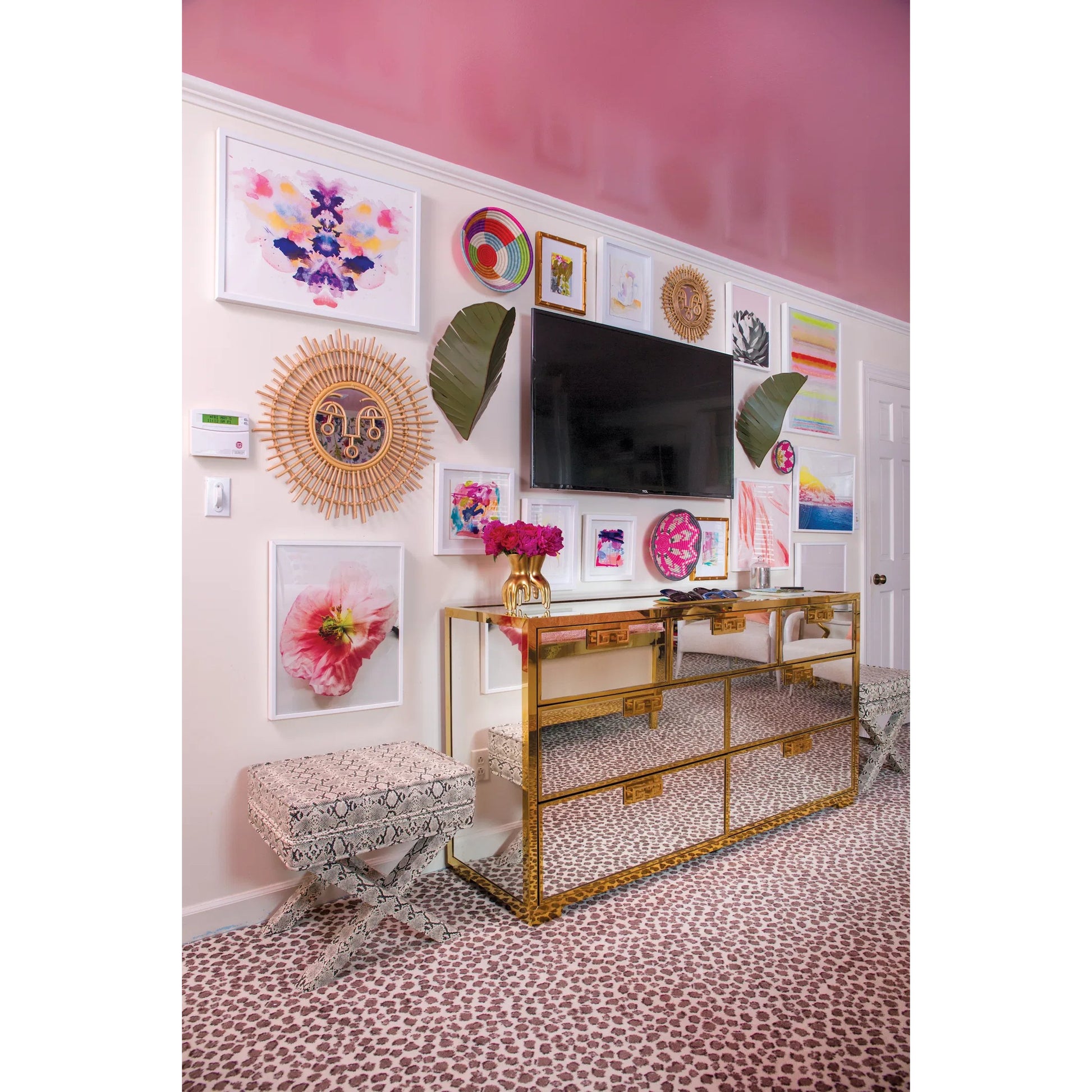 Sconce by Varaluz in banana leaf. Made from banana leaf, recycled steel in a coastal style.