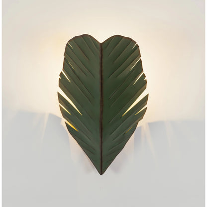 Sconce by Varaluz in banana leaf. Made from banana leaf, recycled steel in a coastal style.