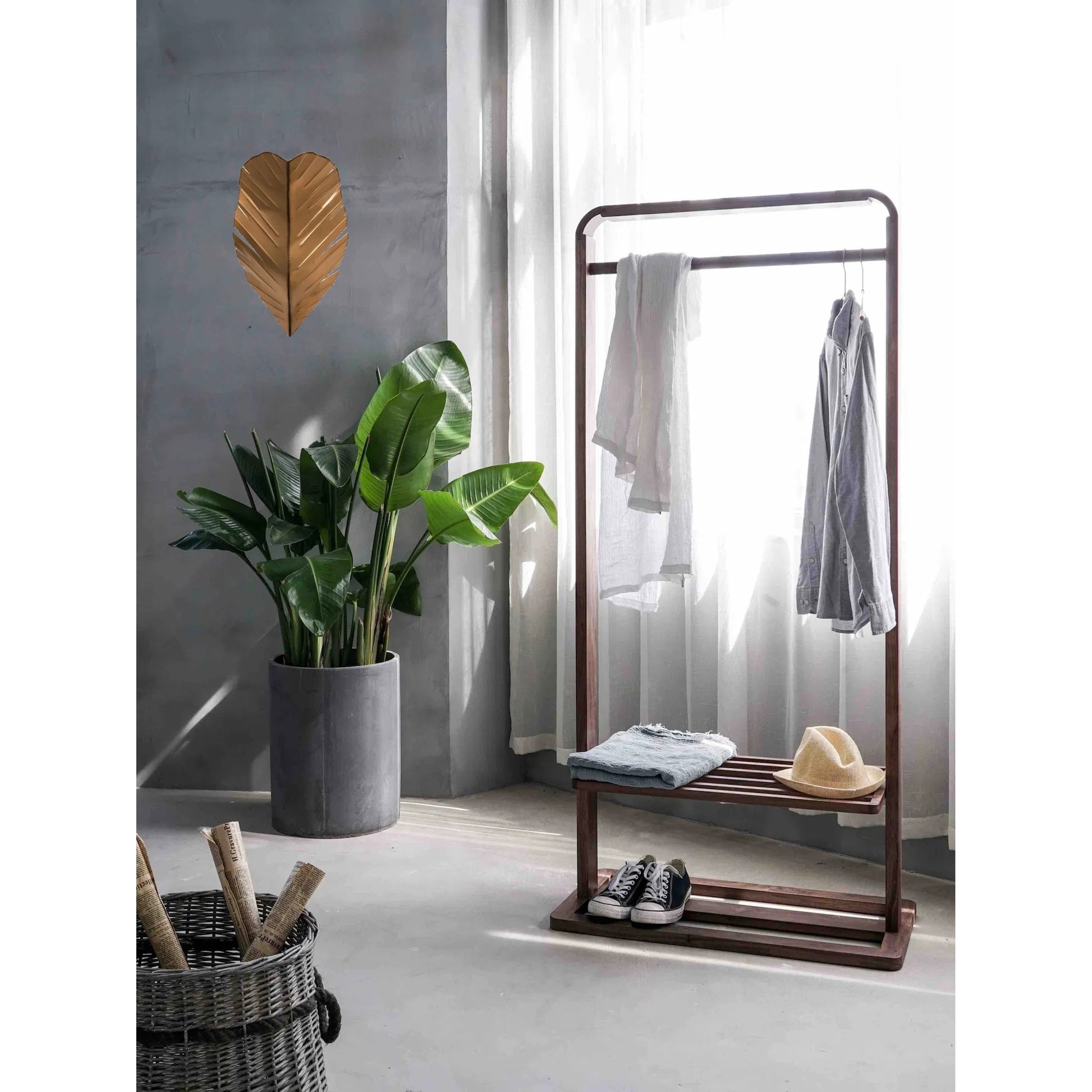 Banana Sconce by Varaluz in gold. Made from unique in a coastal style.