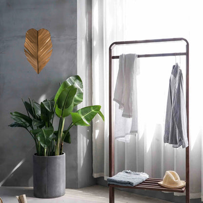 Banana Sconce by Varaluz in gold. Made from unique in a coastal style.