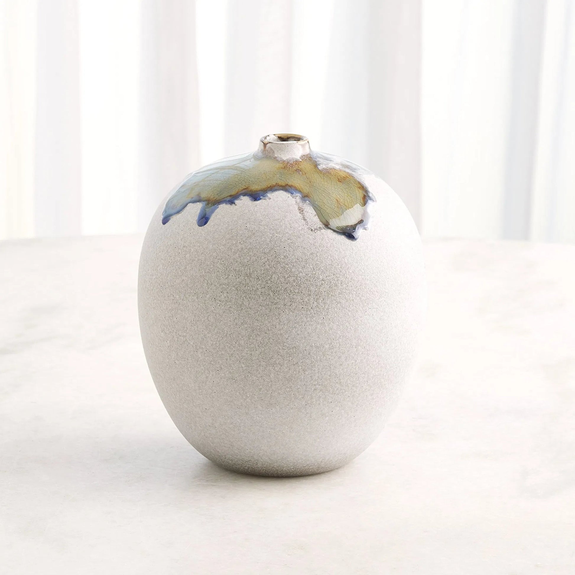 Volcan Vase by Global Views in grey, reactive green. Made from ceramic in a eclectic & global style.