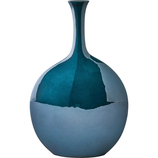 Silhouette Vase by Global Views in reactive blue. Made from ceramic in a unique style.