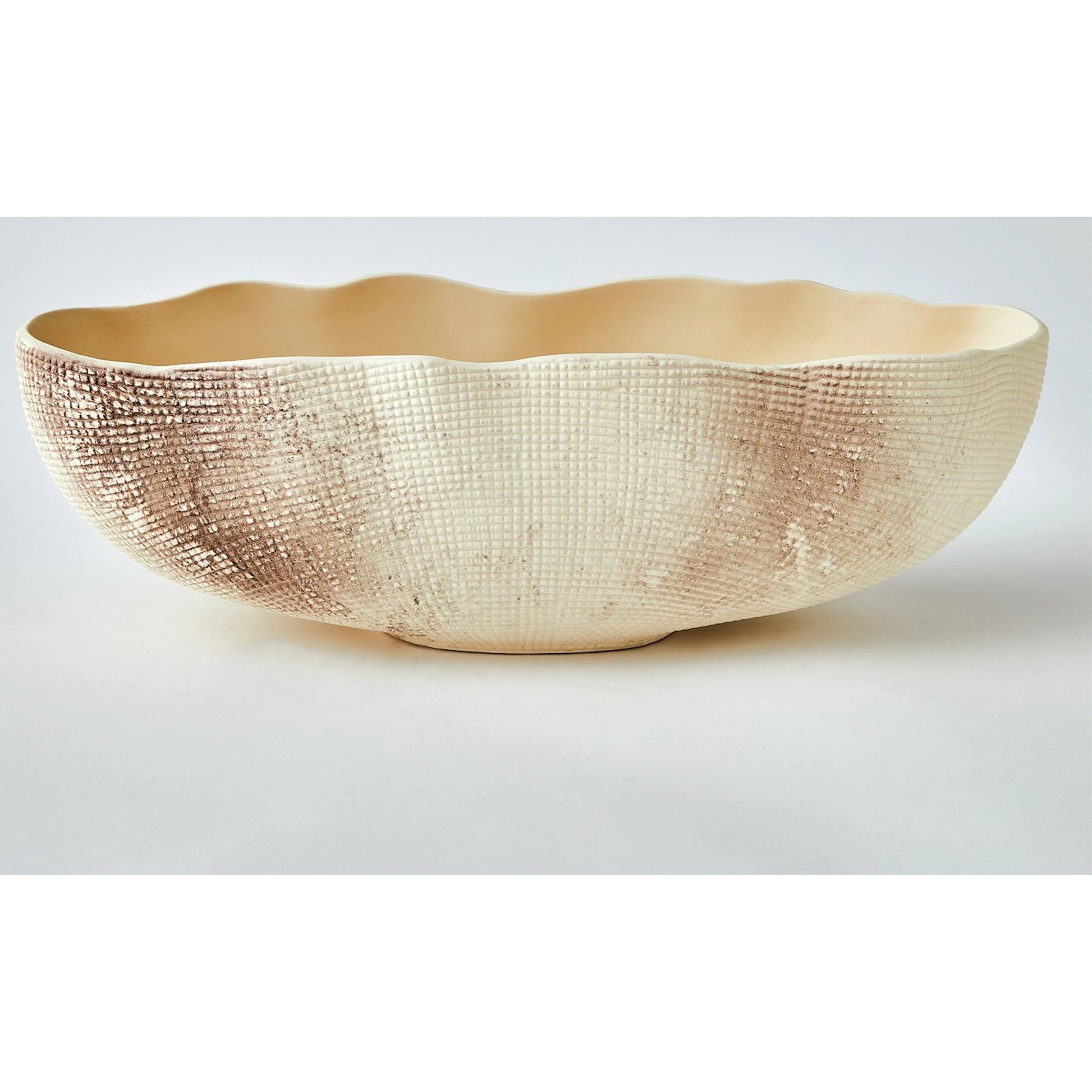 Sisal Oval Bowl by Global Views. Made from ceramic in a coastal style.