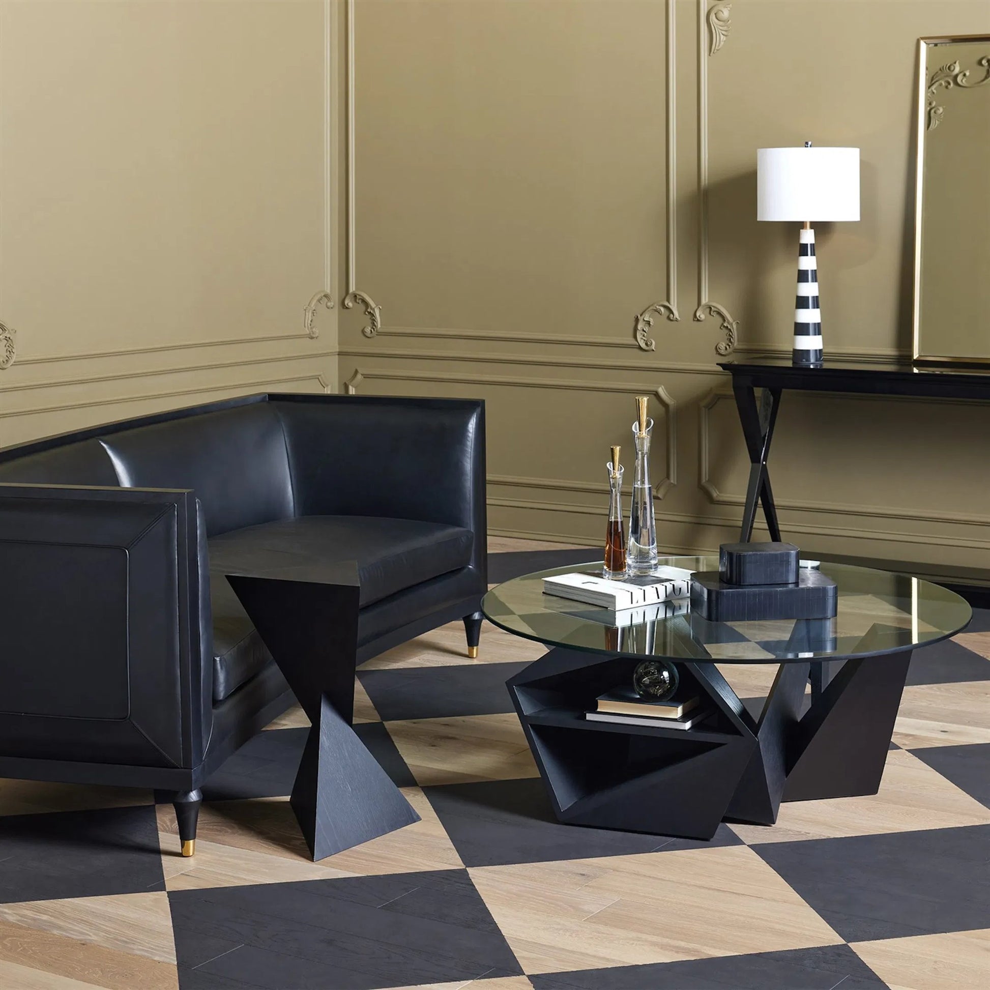 Arc Sofa by Global Views in black and brass. Made from unique in a traditional style.