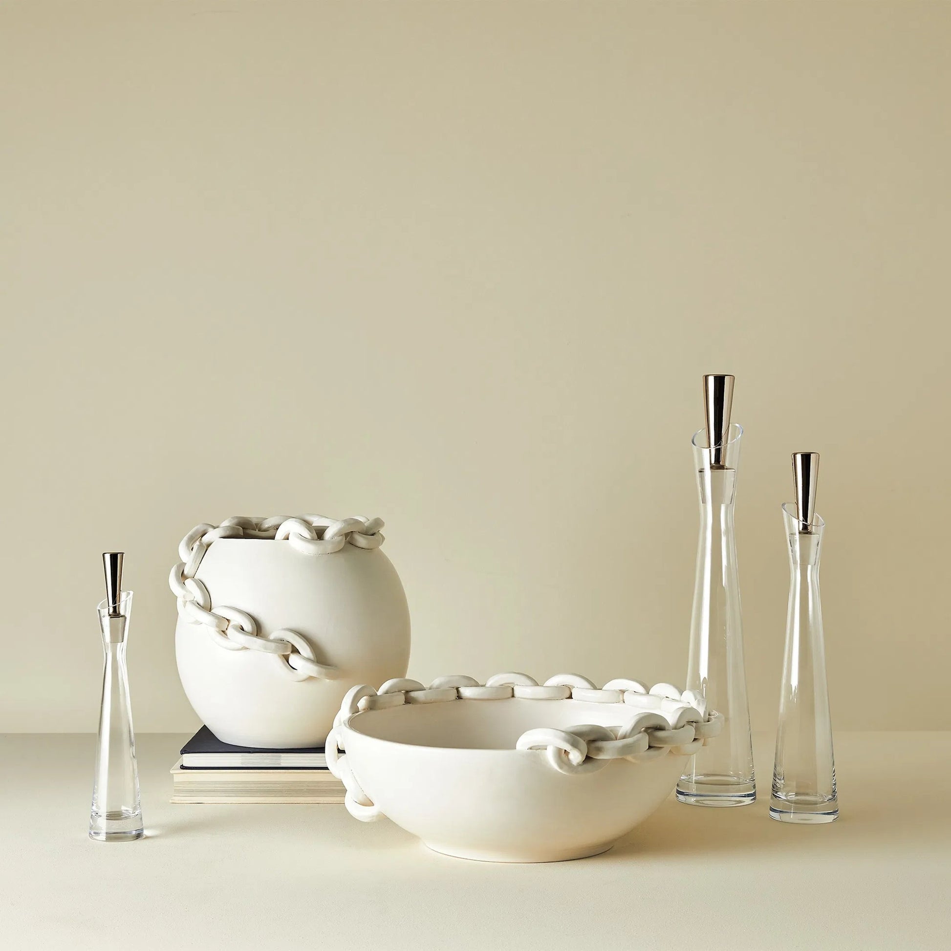 Slant Decanter by Global Views. Made from glass in a transitional style.