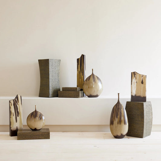 Splash Bottle by Global Views in umber. Made from earthenware in a unique style.