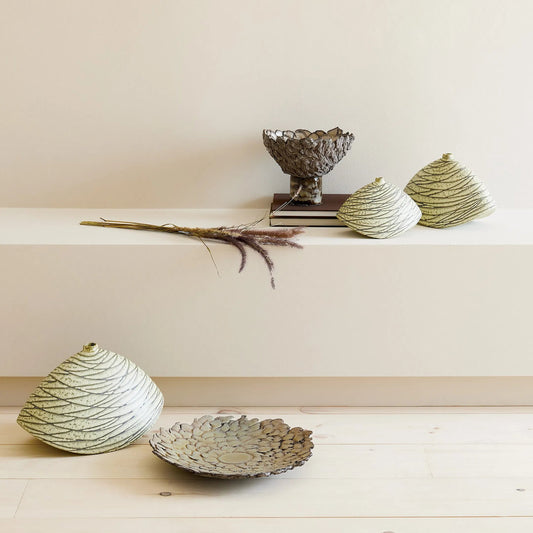 Petaled Pedestal Plate by Global Views in natural. Made from unique in a rustic style.