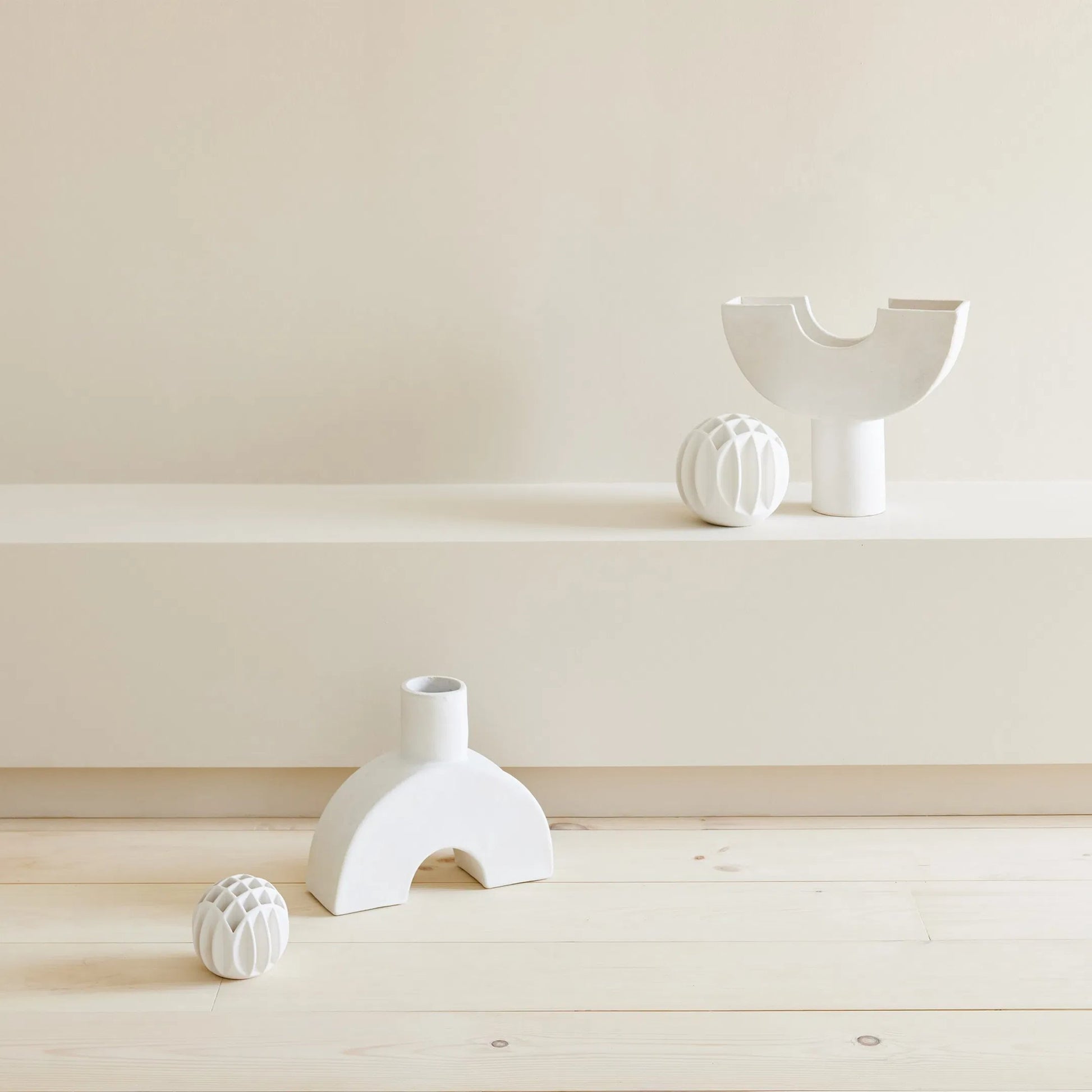 Bud Ball Vase by Global Views. Made from earthenware in a modern style.