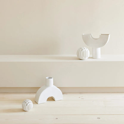 Bud Ball Vase by Global Views. Made from earthenware in a modern style.