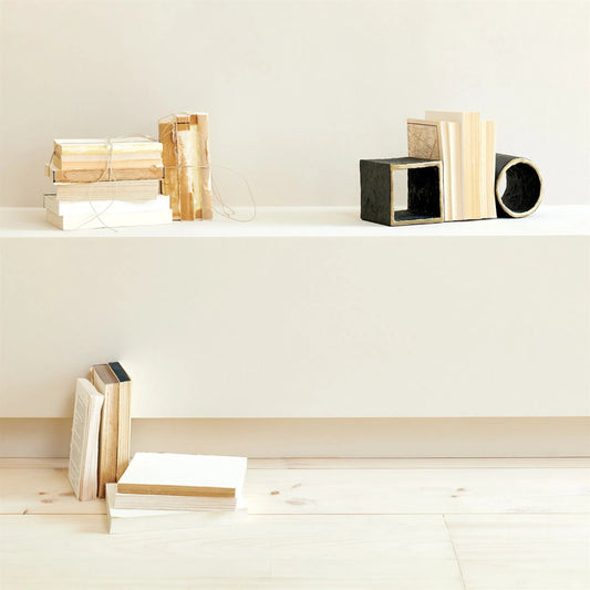 Geometry Bookends by Global Views in gold and brass. Made from unique in a modern style.