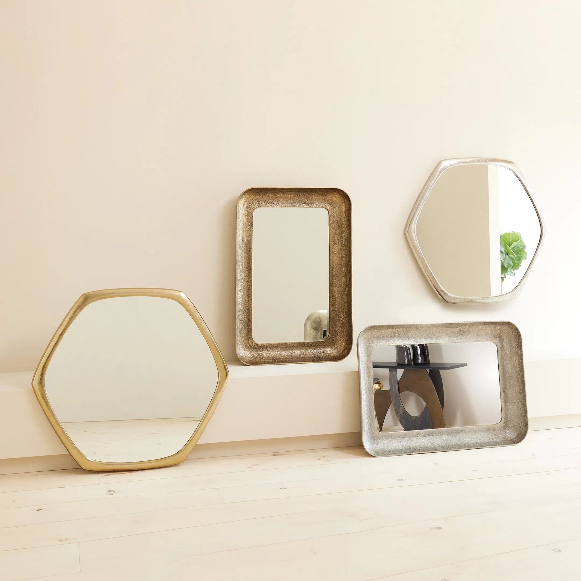Hexagon Mirror by Global Views. Made from aluminum, mirror in a transitional style.